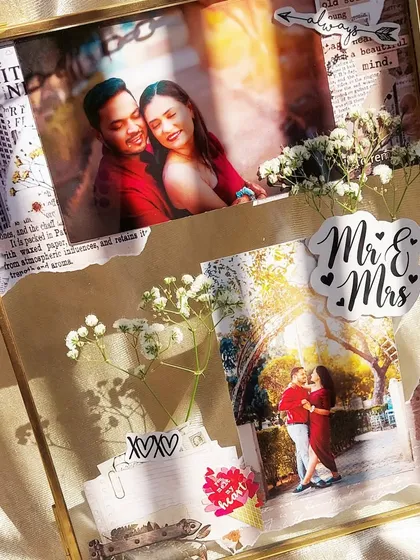 Our copper hanging vintage frames are a stylish way to safeguard your memories. This one, featuring a 'Mr & Mrs' sticker, is a perfect gift for a newlywed couple to display their favorite photos.