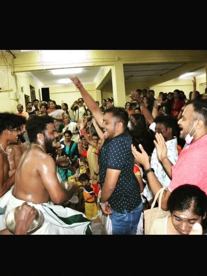 The crowd and performers united in a moment of high energy during a temple festival performance.