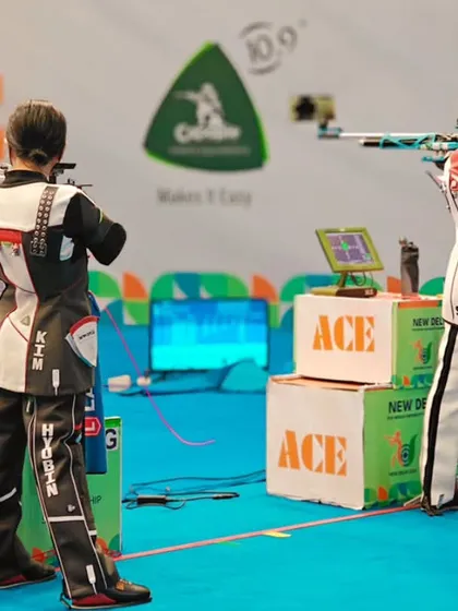 Two finalists in the 10M Air Rifle Women's event, focused and determined. Our events are designed to test the limits of skill and mental fortitude.
