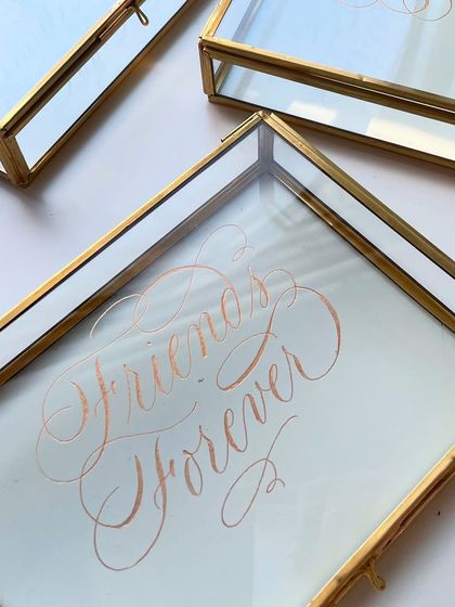 "Friends Forever" engraved in an ornate script on glass keepsake boxes. When a client trusts me to "just make them beautiful," I pour my heart into delivering.