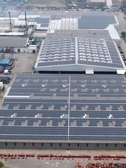 A wide-angle shot of the 4MWp solar power plant we installed at a Coca-Cola bottling facility. The project covers multiple roof sections, demonstrating our ability to design complex layouts that maximize energy generation on existing structures.