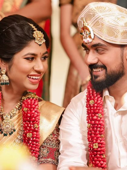 A happy, candid moment between the bride and groom. My makeup is designed to look natural and beautiful in these unposed, heartfelt moments.