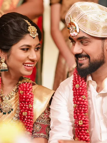 A happy, candid moment between the bride and groom. My makeup is designed to look natural and beautiful in these unposed, heartfelt moments.
