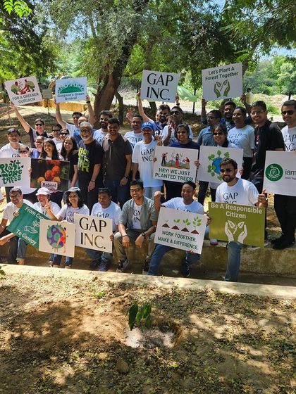 The Gap Inc. team poses proudly after planting 100 native saplings like Moringa and Adusa at Aravali Creek, a crucial flood control system for the city.