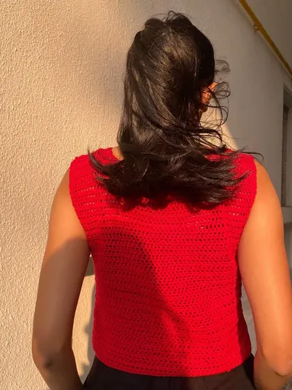 The back of our red summer top has a simple, classic tank design, offering full coverage and a comfortable fit.
