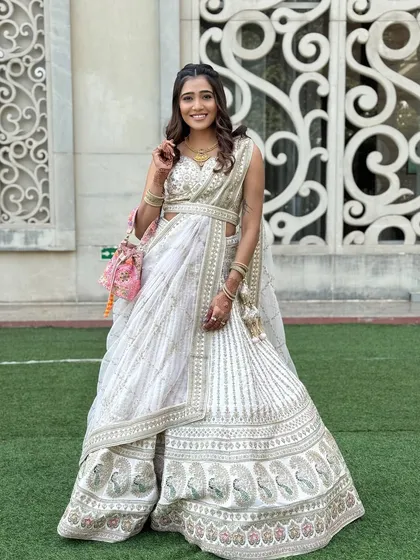 A beautiful, happy client at the Taj Santacruz. Her soft glam makeup and simple, elegant hairstyle are perfect for a sophisticated daytime celebration.