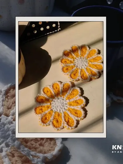 Elevate your tea time with these adorable handmade flower coasters, crocheted in a sunny yellow and white pattern.