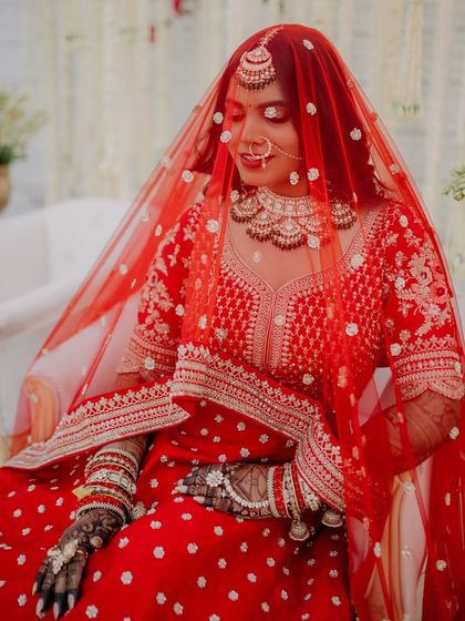 Timeless Red Lehenga Brides photo 33