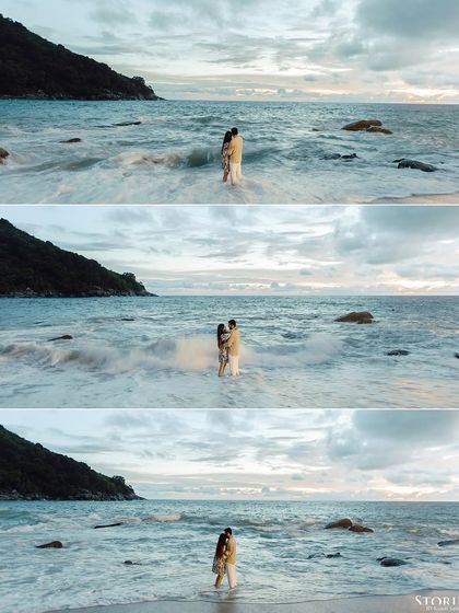 A dramatic three-photo sequence of the couple embracing as waves crash around them.