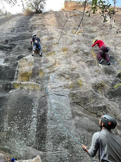 Two climbers ascend parallel routes at Varlakonda. It's always fun to share a wall with a friend and push each other.