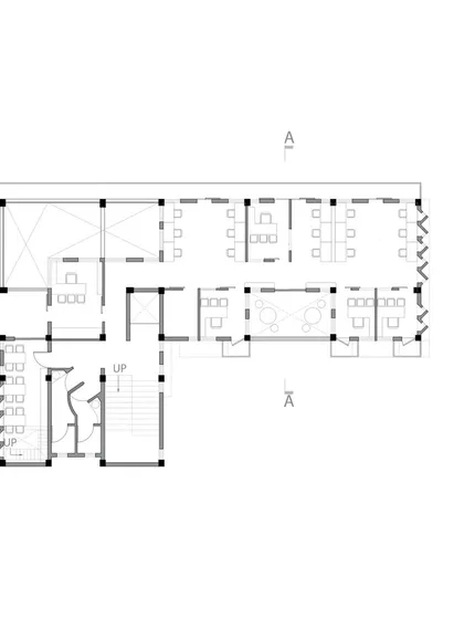 A typical floor plan for the ASA Office, illustrating the layout of workstations, meeting rooms, and the central corridor that opens onto balconies and shared spaces.