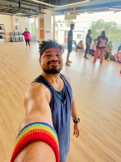 A selfie moment before class begins, wearing my pride wristband. Our studio is a safe and welcoming space for everyone.