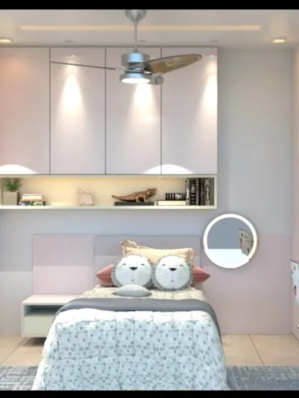 A front view of the bed, highlighting the overhead storage cabinets and the cute lion-faced cushions.