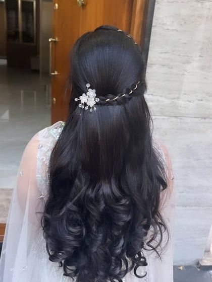 A back view of the hairstyle, showing the pretty accessory.
