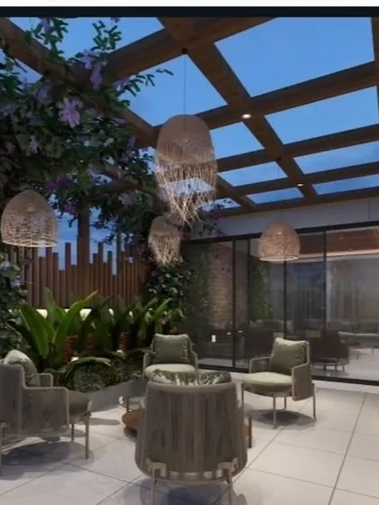 This render showcases a pergola with a glass roof and climbing plants, creating a greenhouse-like effect for a bright and airy seating area.