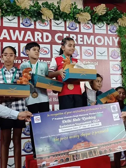Our Girls Doubles U-11 runners-up, Akshita and Kavya, receiving their awards at the Delhi State Ranking Badminton Tournament. Their performance was a display of great teamwork.