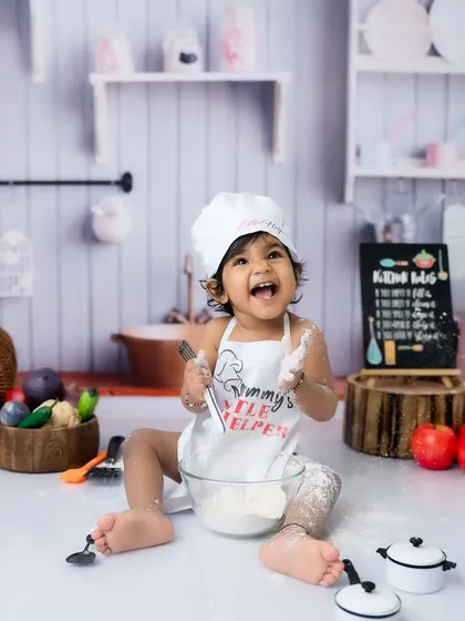 A big, happy laugh from this little cook. My goal is to make every session a fun experience for your child.