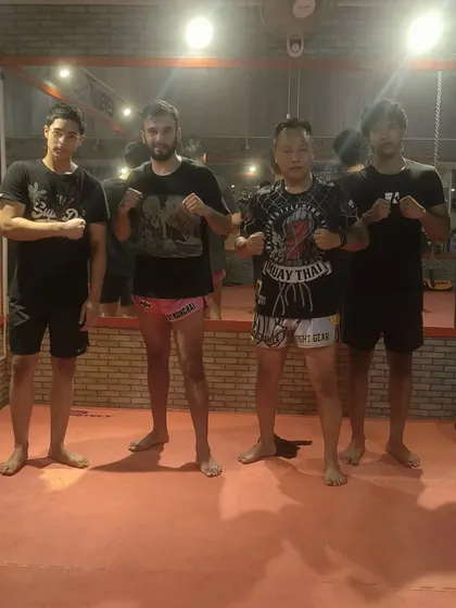 This is our crew after a tough session with Kru Pasenjit. We believe in learning from everyone, and moments like these strengthen our community and deepen our understanding of Muay Thai.