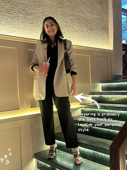 Layering is one of the best hacks to level up your personal style, especially for work. A simple blazer thrown over a classic top and trousers instantly creates a more dynamic and put together outfit.