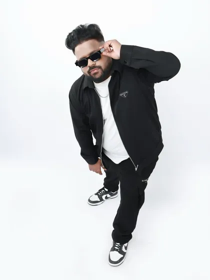 Crafting the right sound starts with the right vibe. This is a shot from one of my studio photoshoots, capturing the energy I pour into every custom music production.