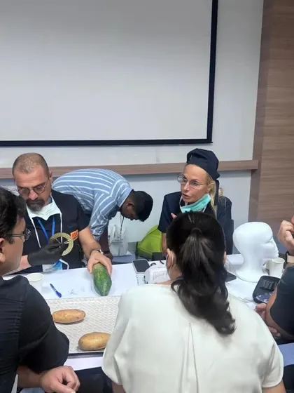 Hands-on practice on simulation models is a crucial part of our workshops, allowing trainees to perfect their technique in a controlled environment.