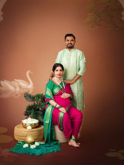 A beautiful couple's portrait in traditional Maharashtrian attire. The 'nauvari' saree and classic kurta create an authentic and culturally rich image.
