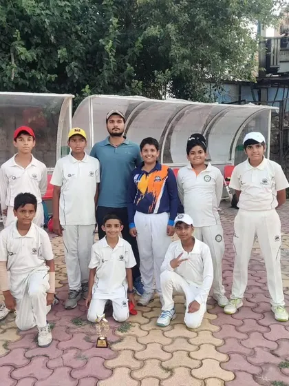 Victory is sweetest when shared. Our Junior Cup U-12 team celebrating together after a hard-fought win in Dwarka. We build not just players, but a supportive team environment.