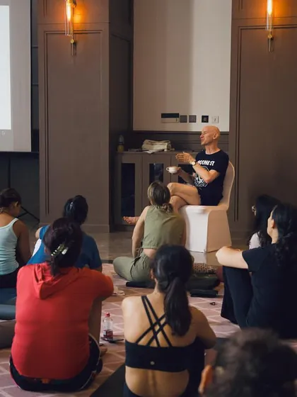 A lecture session during our workshop. We delve into the science and philosophy behind yoga, exploring topics like the nervous system and the Yoga Sutras.