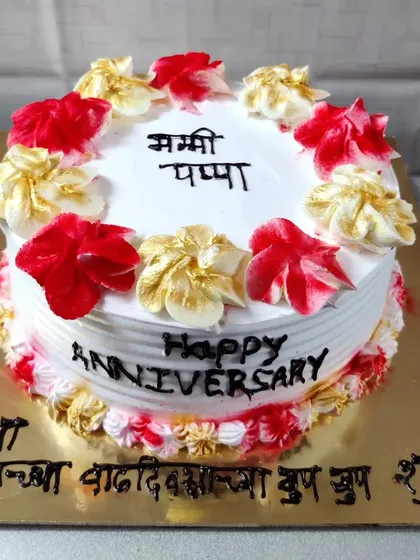 Another lovely anniversary cake for parents, with wishes for their 30th anniversary written in Marathi.