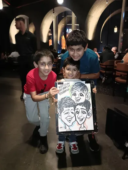 A group of three brothers with their fun group caricature. It's a great way to capture sibling energy.