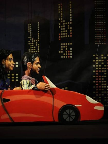 We also create custom puppets for special events. These two were part of a unique show set against a city skyline backdrop.