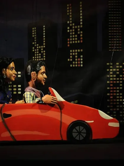 We also create custom puppets for special events. These two were part of a unique show set against a city skyline backdrop.