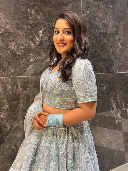 More pictures of my client enjoying her event in the powder blue lehenga. It's so rewarding to see my outfits become a part of someone's happy memories.