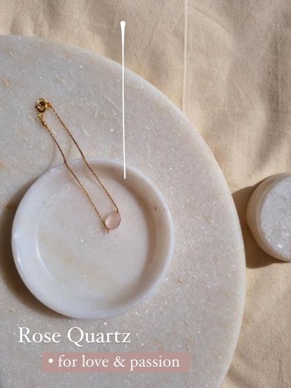 This delicate 'iñcid' oval bracelet features a Rose Quartz stone, known for its loving vibrations. I created this piece to help heal relationship issues and attract new connections. It's a subtle, beautiful reminder to stay open to love.