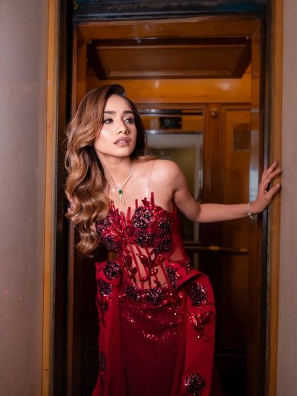 Another angle of the elevator shot, showcasing the intricate details of the gown.