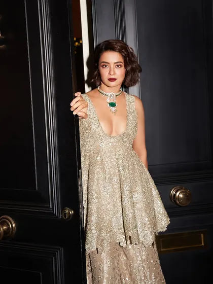 Another angle of Surveen Chawla's captivating look, where our jewelry adds the final touch of couture elegance.