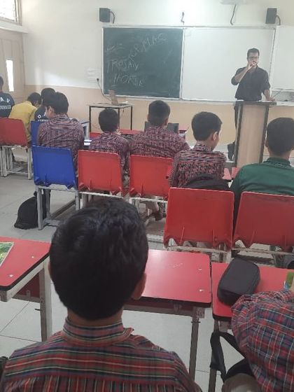 Another angle of our workshop, showing the instructor guiding the class through a lesson. We ensure our trainers are always accessible to students.