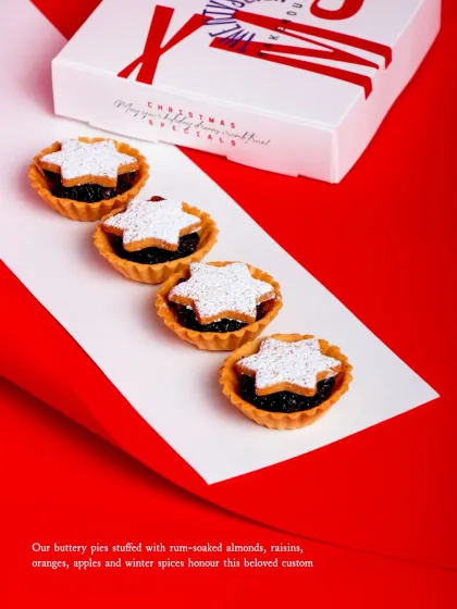 Our buttery pies are stuffed with rum-soaked almonds, raisins, oranges, apples, and winter spices.