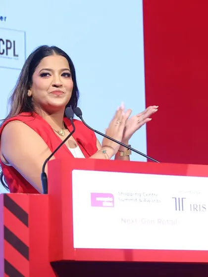 Applauding a speaker at the MAPIC India event. My role is to support and elevate everyone who takes the stage.