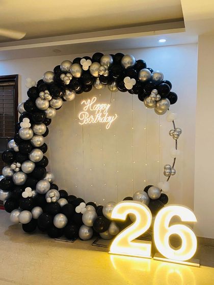 The complete 26th birthday setup with the balloon ring and light-up numbers.