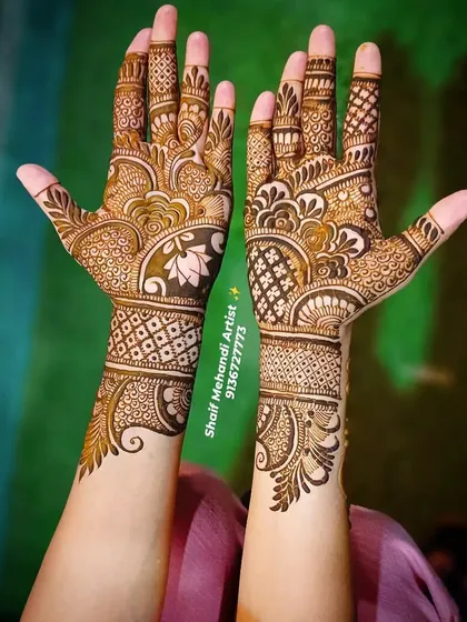 The same lotus design from a different angle, showing the back of one hand and the front of the other.