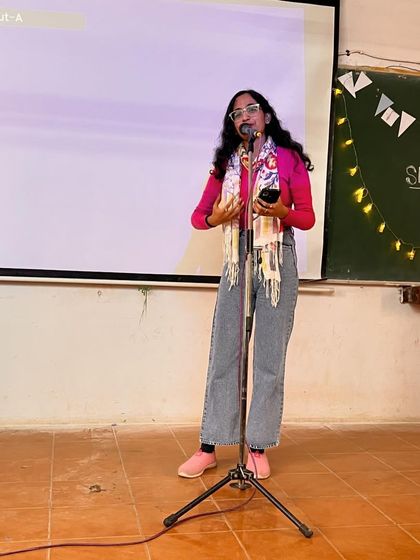 A passionate performance by a student at Gargi College's 'Swipe Write' event. The enthusiasm of college audiences is infectious.