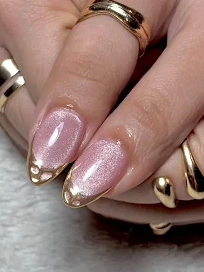 A close-up on the gold chrome tip, showing the flawless application and high-shine finish.