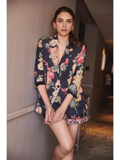 This floral blazer and shorts set by Ranna Gill is a fun and stylish take on suiting. It's perfect for a daytime event or a promotional appearance.
