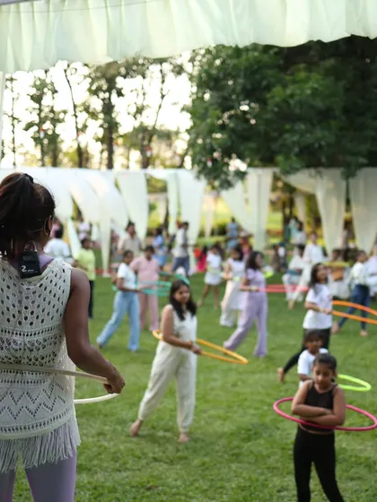 Here I am, leading a hula hoop workshop at Zenfest in Hyderabad. I love seeing a field full of people, from total beginners to kids, all finding their own rhythm. My workshops are all about creating a fun, no-pressure space to play and learn together.