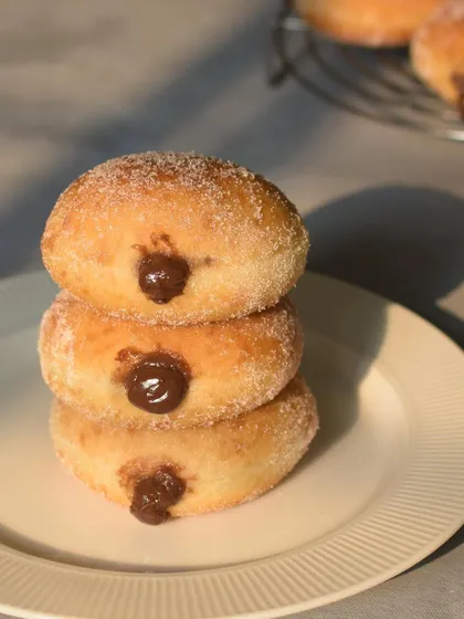 A tower of my Nutella-filled doughnuts, coated in cinnamon sugar. These are a popular choice and are available for pre-order.