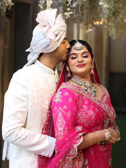 A candid moment from my wedding. You can see how the makeup looks flawless and radiant up close, even after hours.