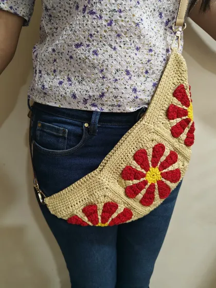 This view shows the crescent shape of the fanny pack. In my classes, I teach you how to shape your projects to get the exact design you want.