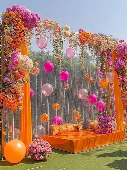 A duplicate of the vibrant outdoor Mehendi setup, showcasing the beautiful combination of fresh flowers and balloons.