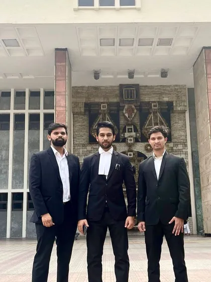 With two of my associates. I am proud to have mentored them and to now work alongside them as trusted colleagues in the legal field.